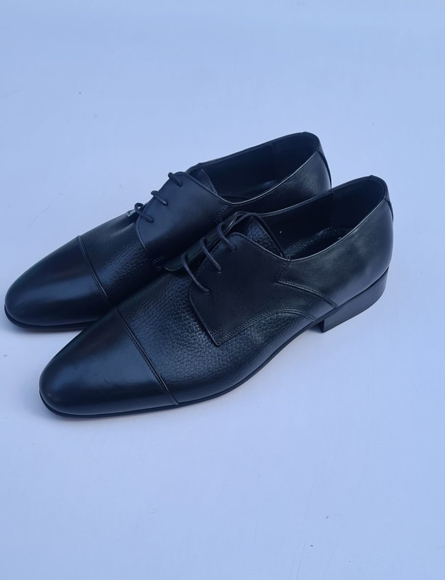 sleek black derby shoes