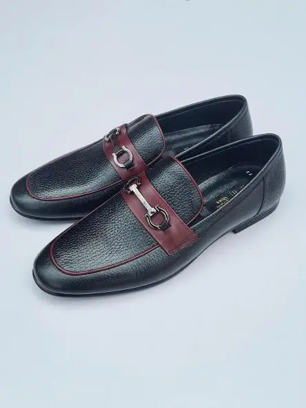 black men loafers with a maroon trim and silver buckle